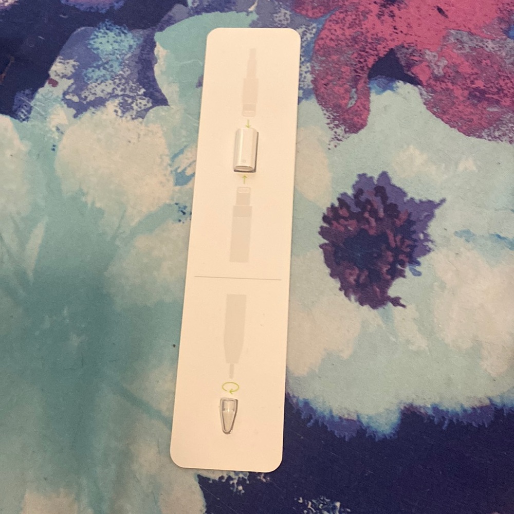 This is an Apple Pen adapter and Apple pen cap